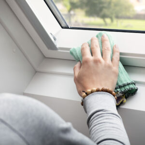 cleaning white roof window